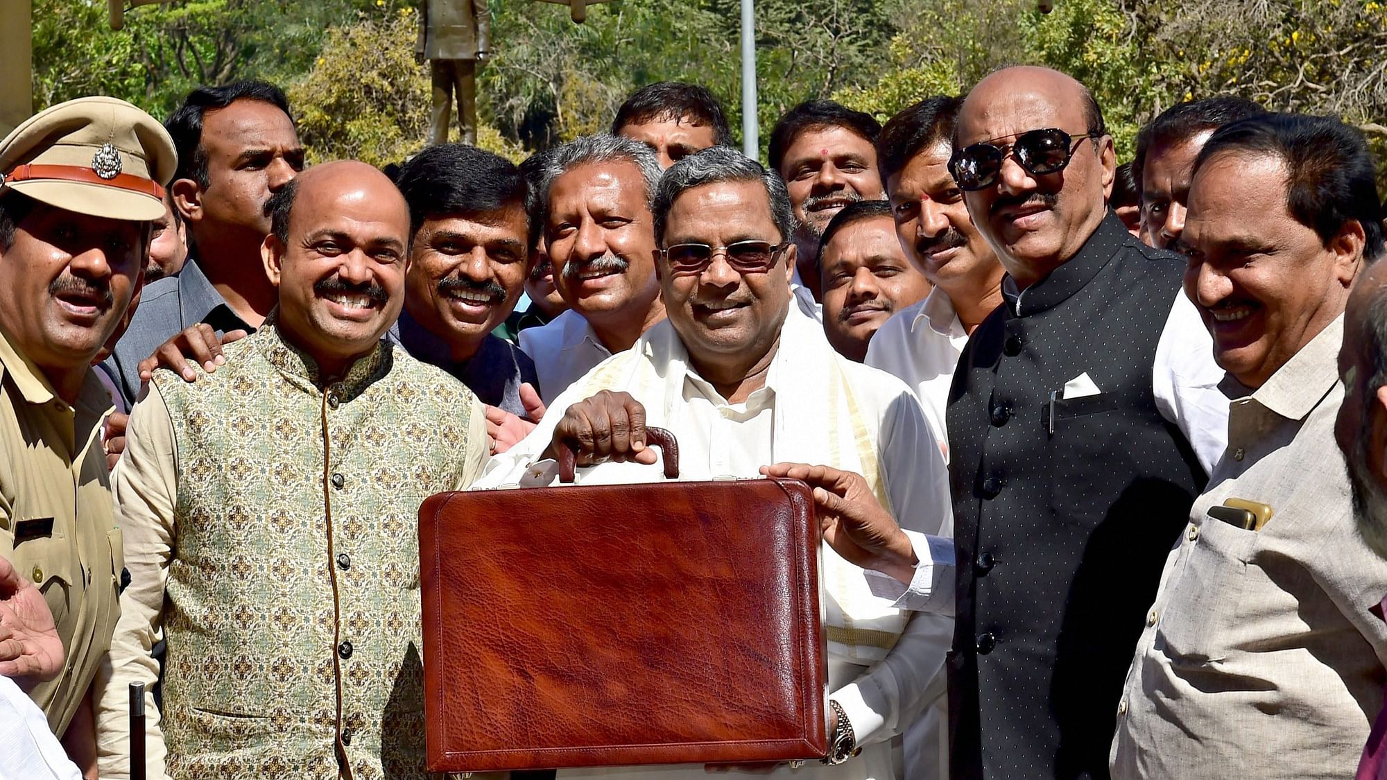 Karnataka Chief Minister Siddaramaiah arrives at Vidhana Soudha to present the state budget in Bengaluru on Friday