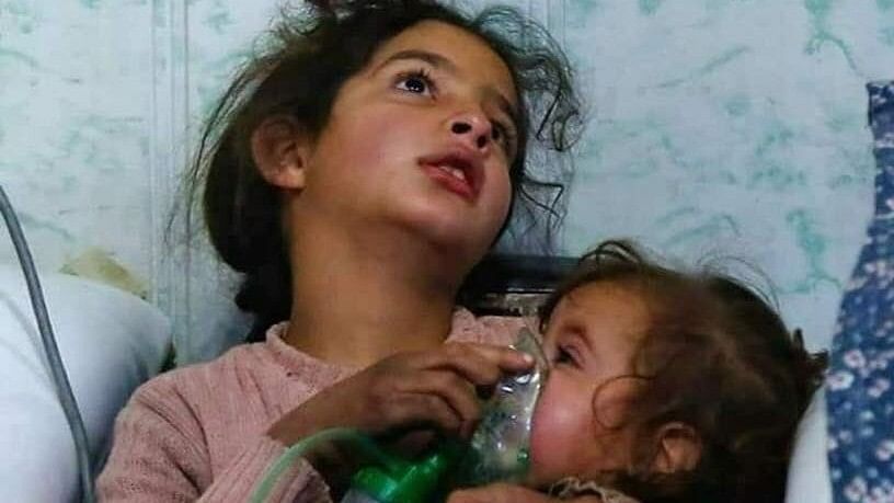 A photo of two child survivors of the bombing shared by a team of volunteers from Syria.