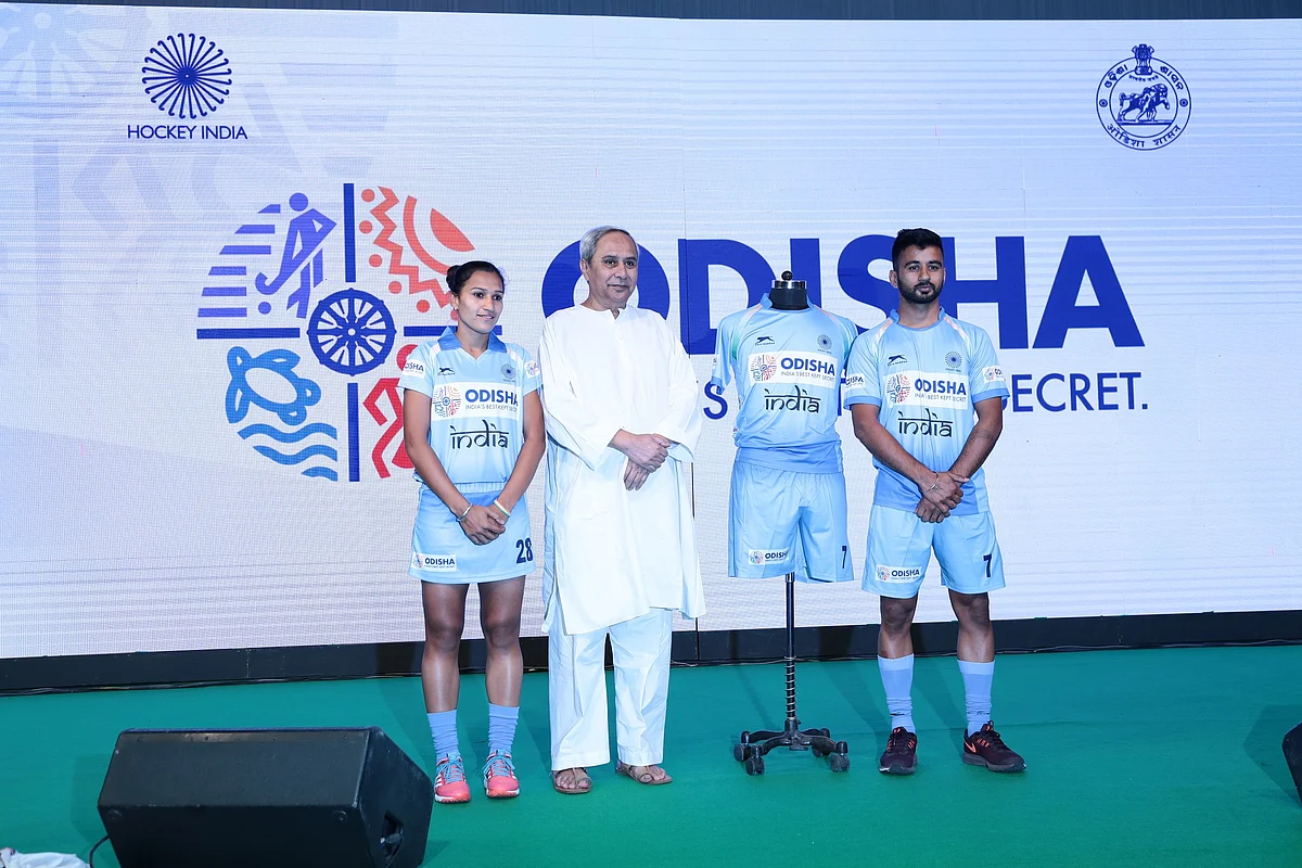 Women’s hockey captain Rani Rampal, Odisha Chief Minister Naveen Patnaik and men’s hockey skipper Manpreet Singh.