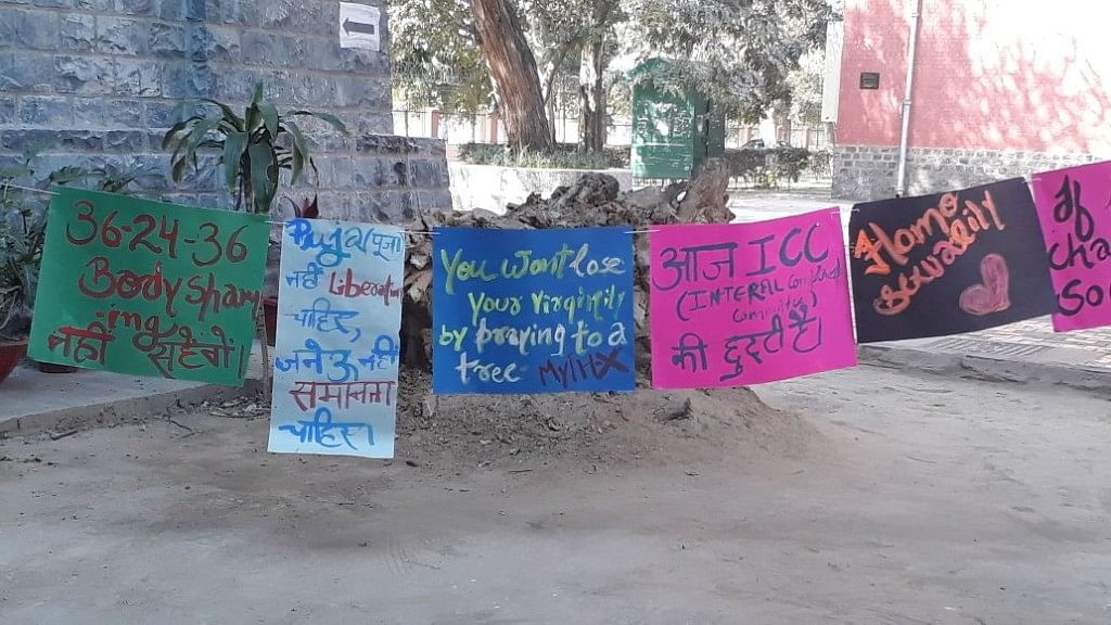 Posters protesting the virgin tree ritual conducted inside the Delhi University’s Hindu College every Valentine’s Day.