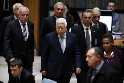 UNITED NATIONS, Feb. 20, 2018 (Xinhua) -- Palestinian President Mahmoud Abbas (C) arrives to attend a United Nations Security Council meeting on the Middle East situation at the UN headquarters in New York, on Feb. 20, 2018. Abbas told the UN Security Council on Tuesday that "Israel shut the door on the two-state solution." (Xinhua/Li Muzi/IANS)