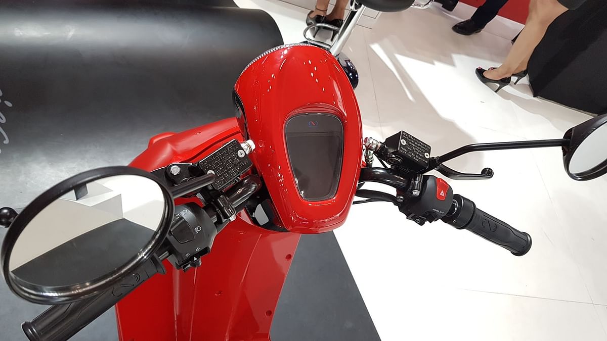 This electric scooter can run 80 kilometres  per charge and its features including cruise control and  reverse gear.