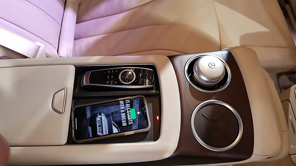 The centre armrest has wireless phone charging capability. 
