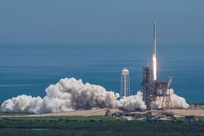 FLORIDA (U.S.), Aug. 14, 2017 (Xinhua) -- The photo released by SpaceX on Aug. 14, 2017 shows Falcon 9 rocket, with the Dragon spacecraft sitting on the top, launching at NASA
