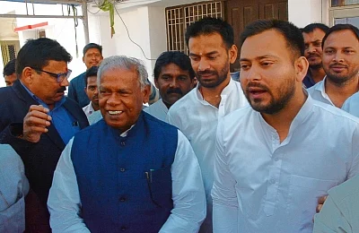 Patna: Hindustani Awam Morcha-Secular (HAM-S) Jitan Ram Manjhi along with RJD leaders Tejashwi Yadav and Tej Pratap Yadav in Patna on Feb 28, 2018. The Hindustani Awam Morcha-Secular (HAM-S) on Wednesday announced its exit from the National Democratic Alliance (NDA) with the BJP and said it would be joining the Grand Alliance led by the Rashtriya Janata Dal. (Photo: IANS)