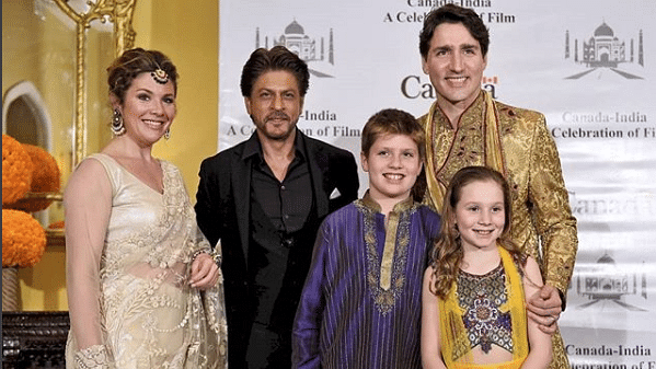 The Trudeau family with Shah Rukh Khan.&nbsp;