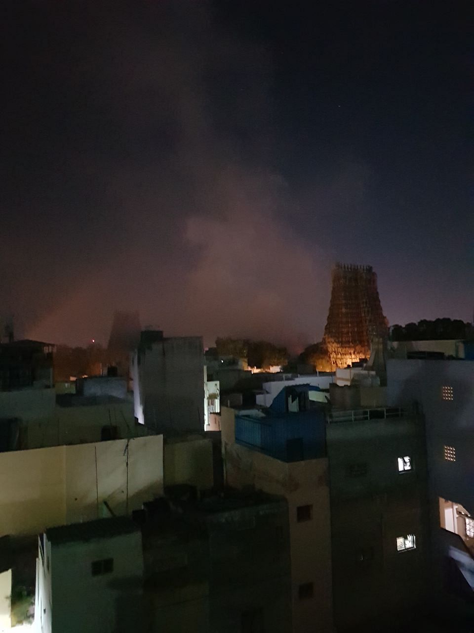The fire along the temple, spotted from a distance.&nbsp;
