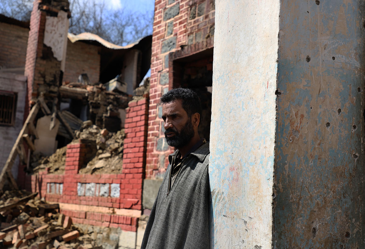 Ghulam, a 52-year-old poet, saw his ancestral home reduced to ashes and rubble. 