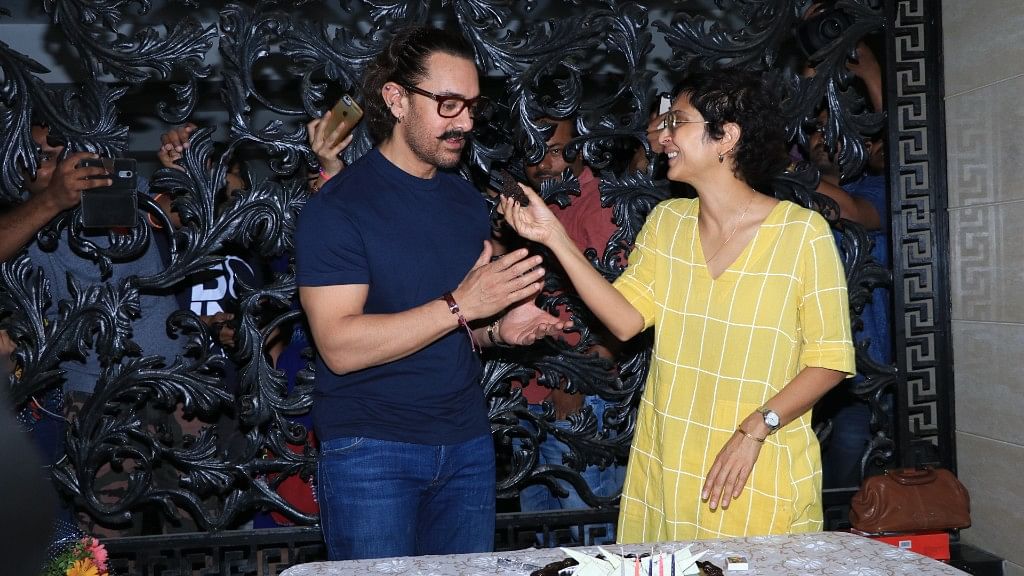 Aamir Khan eats his birthday cake with wife Kiran Rao.&nbsp;