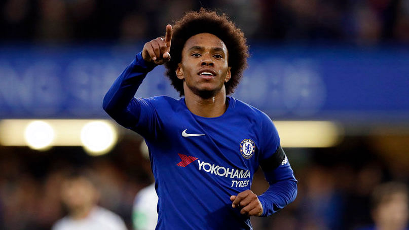 Chelsea’s Willian celebrates after scoring the opening goal against Crystal Palace.
