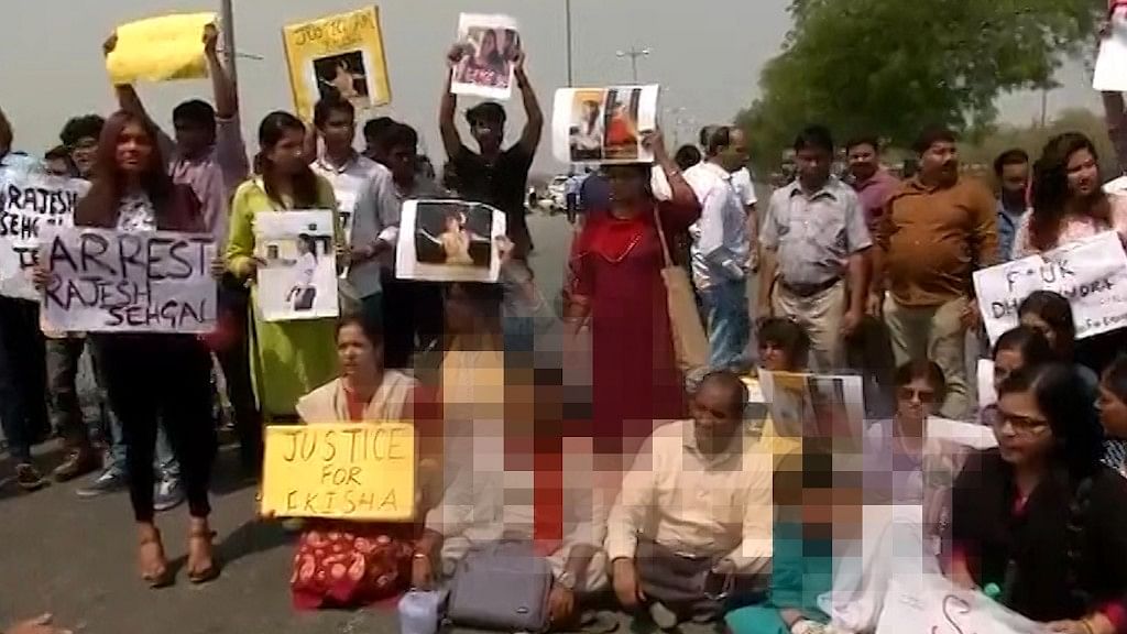 A protest outside the school of the Noida teen who committed suicide.