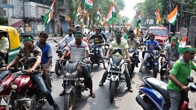 Trinamool Congress workers participate in a bike rally organised on Ram Navami in Kolkata, on 25 March 2018.