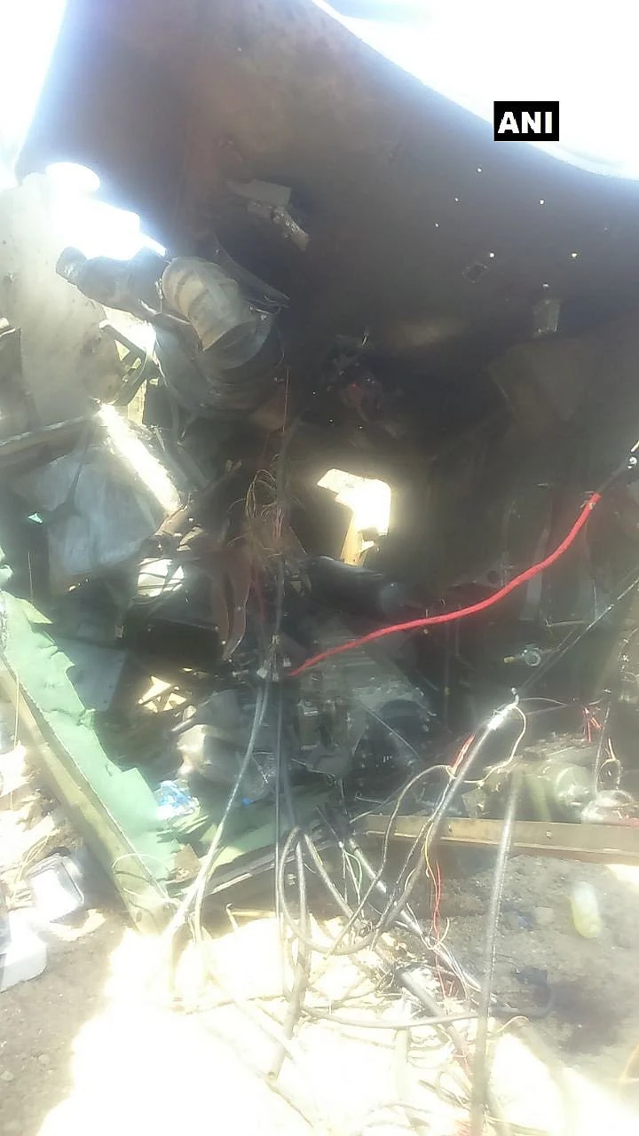 A photo of the charred remains of the CRPF vehicle.