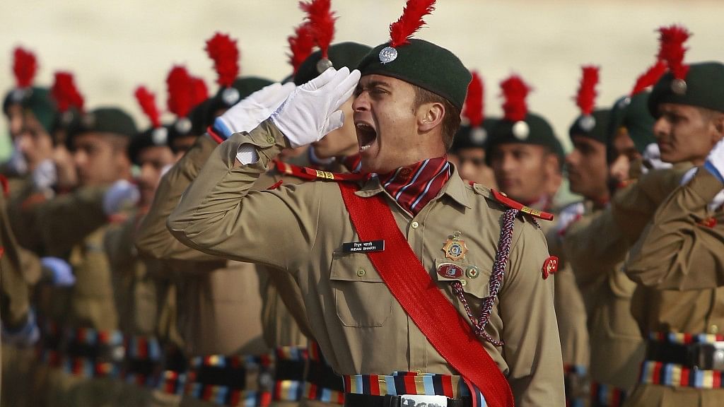 A National Cadet Corps member gives a command during a rehearsal of the Republic Day parade in Jammu, India, Wednesday, 24 January 2018.&nbsp;