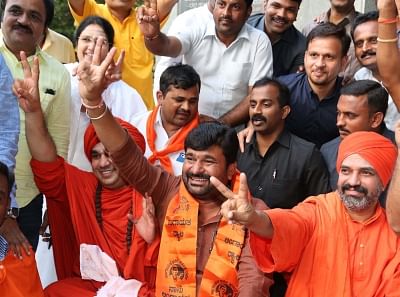 Bengaluru: Members of Lingayat community celebrate after Karnataka cabinet agreed to consider the Hindu sect of Lingayats as a separate religion, in Bengaluru on March 19, 2018. (Photo: IANS)