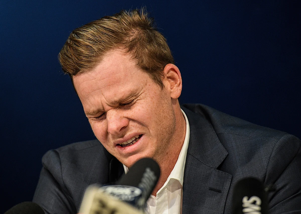 Steve Smith breaks down while talking about his parents.