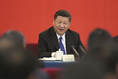 BEIJING, March 4, 2018 (Xinhua) -- Chinese President Xi Jinping, also general secretary of the Communist Party of China (CPC) Central Committee and chairman of the Central Military Commission, attends a joint panel discussion with political advisors from the China Democratic League and the China Zhi Gong Party, those without party affiliation and those from the sector of returned overseas Chinese, at the first session of the 13th National Committee of the Chinese People