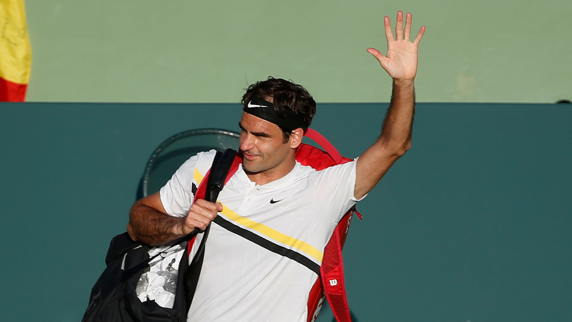 Roger Federer, of Switzerland, waves to the crowd after Thanasi Kokkinakis, of Australia, defeated him in a tennis match at the Miami Open, Saturday, March 24, 2018, in Key Biscayne, Fla.