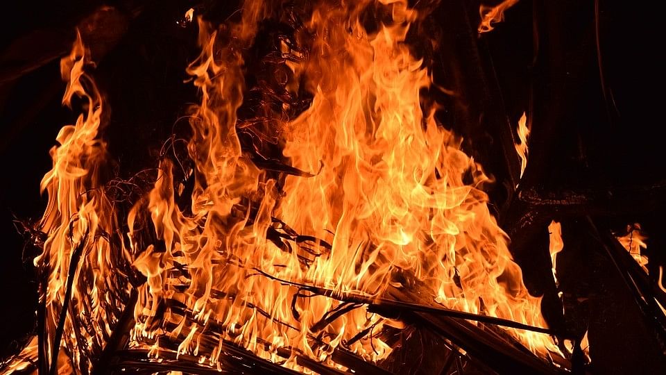 The accused and his wife got angry after Ahirwar and others lit the bonfire to mark the occasion, which they feared would engulf their house.