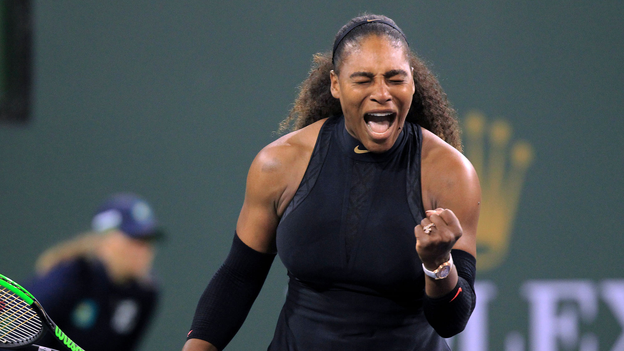 Serena Williams clenches her fist while playing Zarina Diyas during the first round of the BNP Paribas Open tennis tournament in Indian Wells, Calif., Thursday, March 8, 2018.