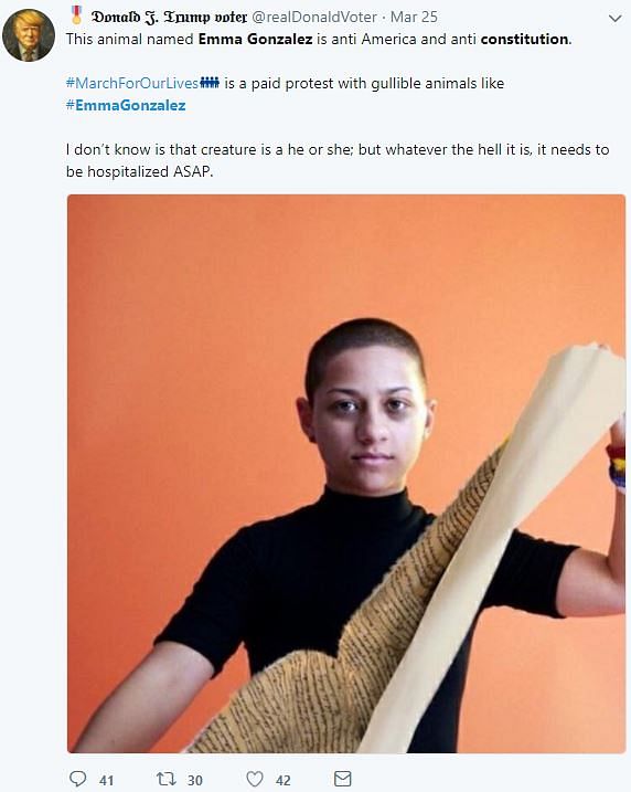 The real image of Emma Gonzalez, survivor of the Parkland mass shooting, shows her tearing a shooting target poster.