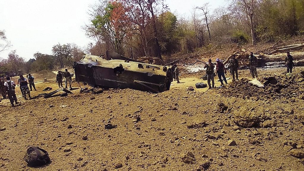 Security personnel inspect the site of an IED blast where nine CRPF personnel were killed in Chhattisgarh’s Sukma district. &nbsp;