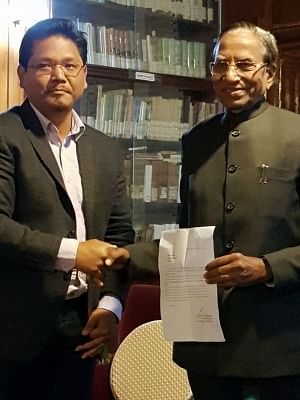 Shillong: NPP president Conrad Sangma calls on Meghalaya Governor Ganga Prasad with a letter to form government in the state in Shillong on March 4, 2018. (Photo: IANS)