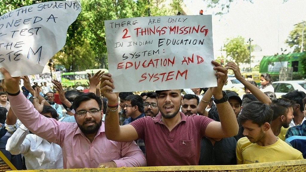 Students protest over CBSE Class X Mathematics and Class XII Economics paper leak, at Jantar Mantar in New Delhi.