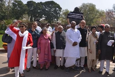 New Delhi: Congress MPs led by party president Rahul Gandhi stage a demonstration to press for their demands in front of Mahatma Gandhi