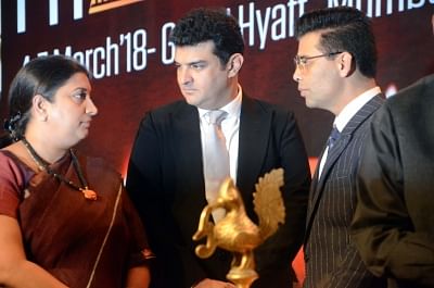 Mumbai: Union Information and Broadcasting Minister Smriti Irani during inauguration of FICCI-FRAMES 2018 in Mumbai, on March 4, 2018. Also seen filmmaker Karan Johar and  Film and Television Producers Guild of India president Siddharth Roy Kapur. (Photo: IANS)