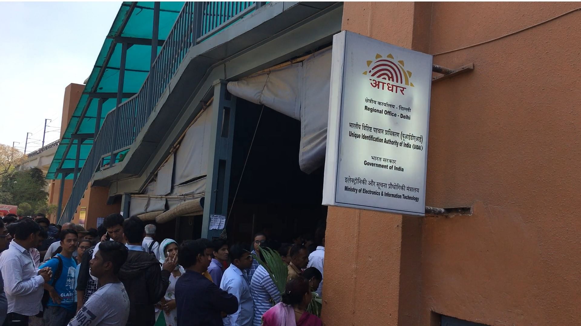 The crowd swells outside the Regional Aadhaar Center at Paragati Maidan Metro Station in New Delhi.&nbsp;
