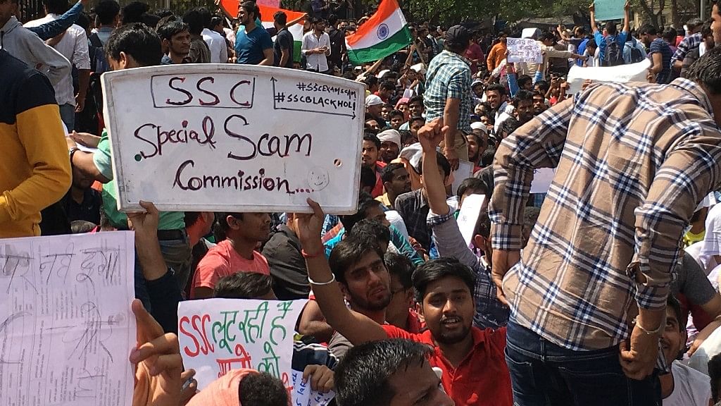 Students protest outside the SSC office in Delhi.