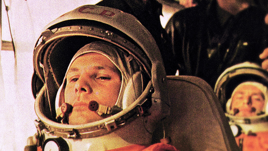 In this image Yuri Gagarin, pilot of the Vostok 1, is on the bus on the way to the launch.