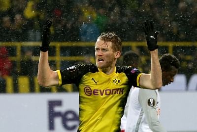 DORTMUND, March 9, 2018 (Xinhua) -- Andre Schurrle of Dortmund celebrates scoring during the UEFA Europa League round of 16 first leg match between Germany