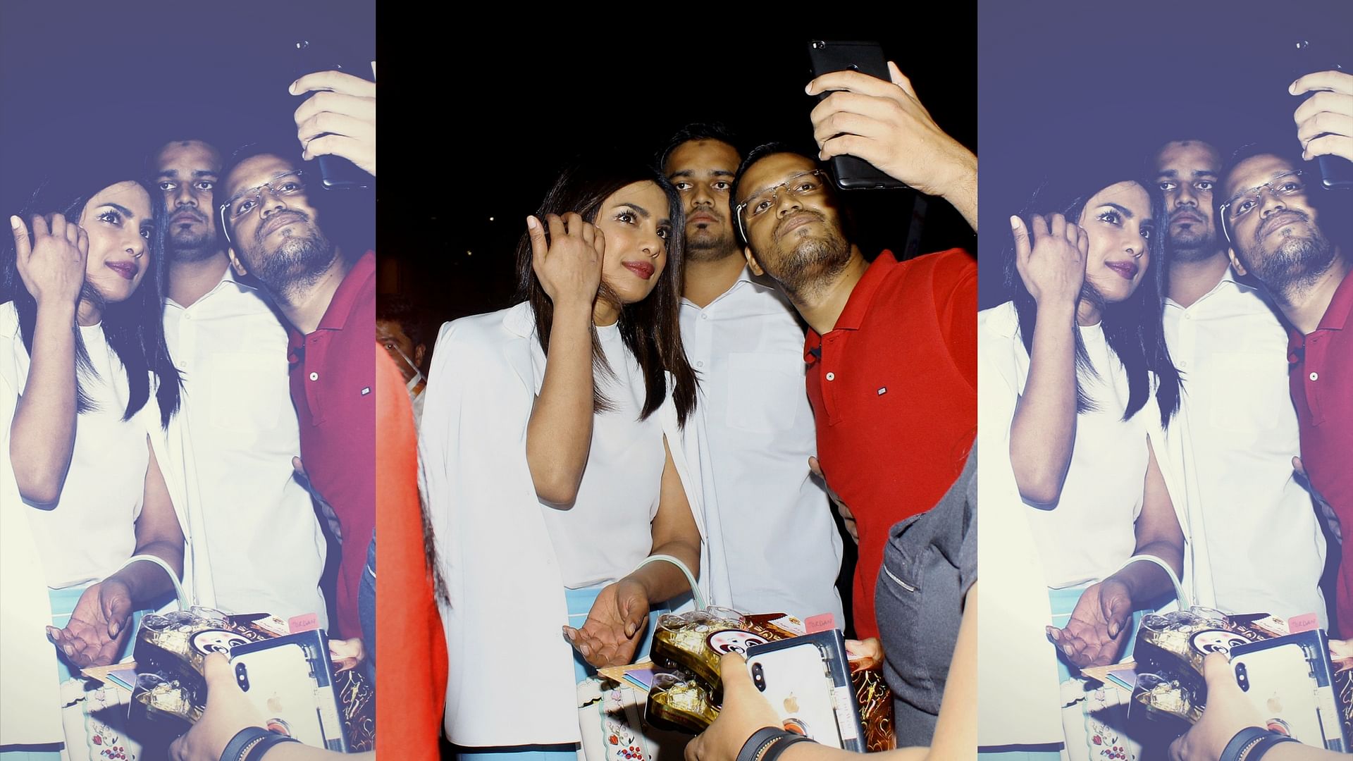 Priyanka Chopra poses for a selfie with a fan.