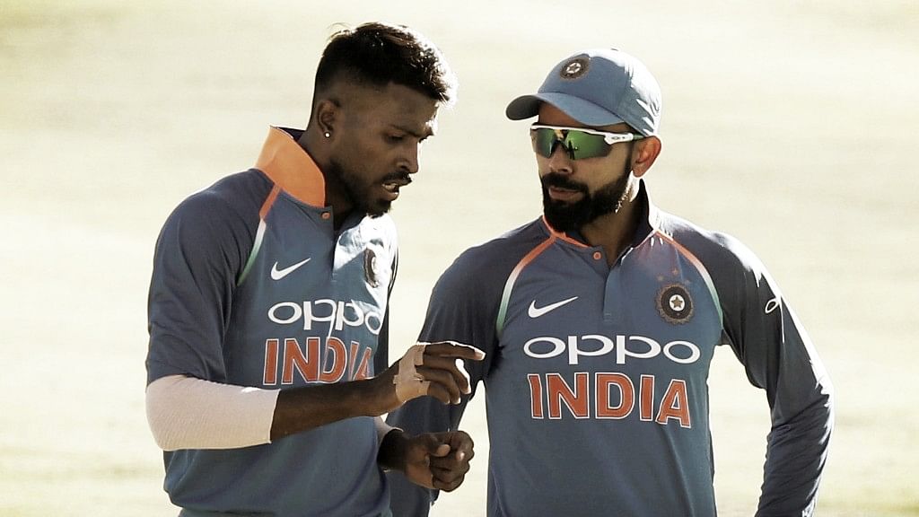 Hardik Pandya confers with captain Virat Kohli during an ODI.