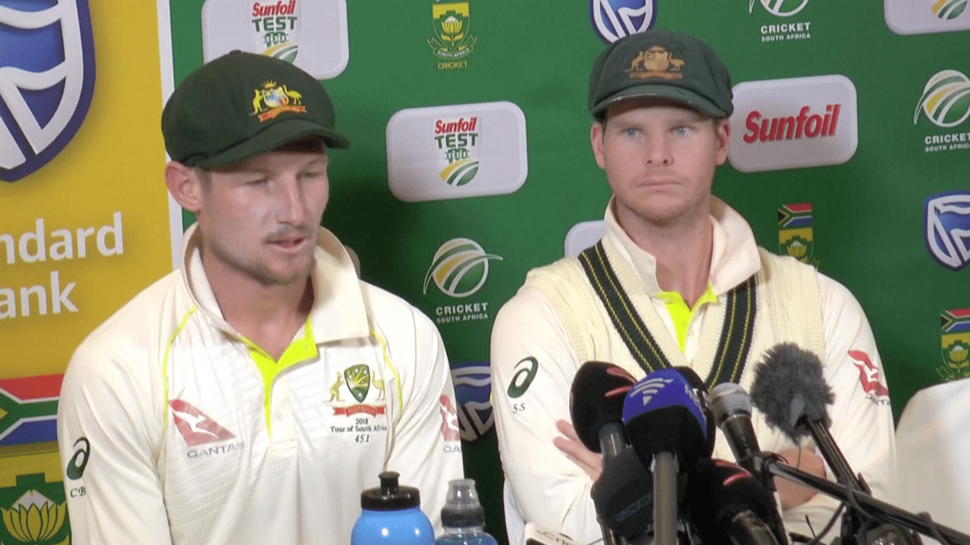 Steve Smith (R) and Cameron Bancroft speak to the media about the ball-tampering row during the third Test against South Africa.