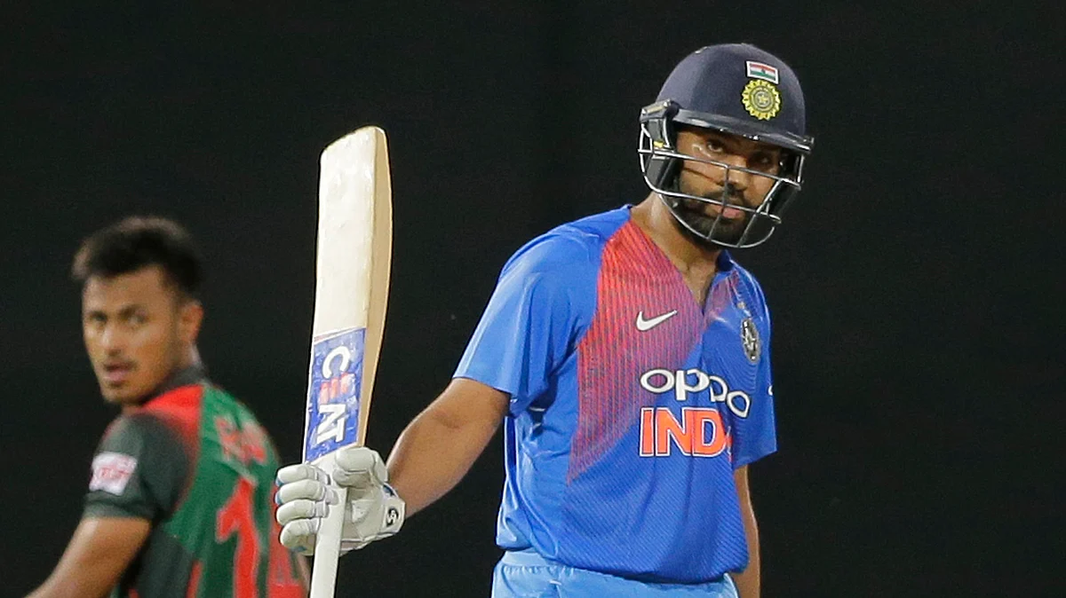 India’s Rohit Sharma celebrates scoring fifty runs against Bangladesh during their second Twenty20 cricket match in Nidahas triangular series in Colombo, Sri Lanka, Wednesday