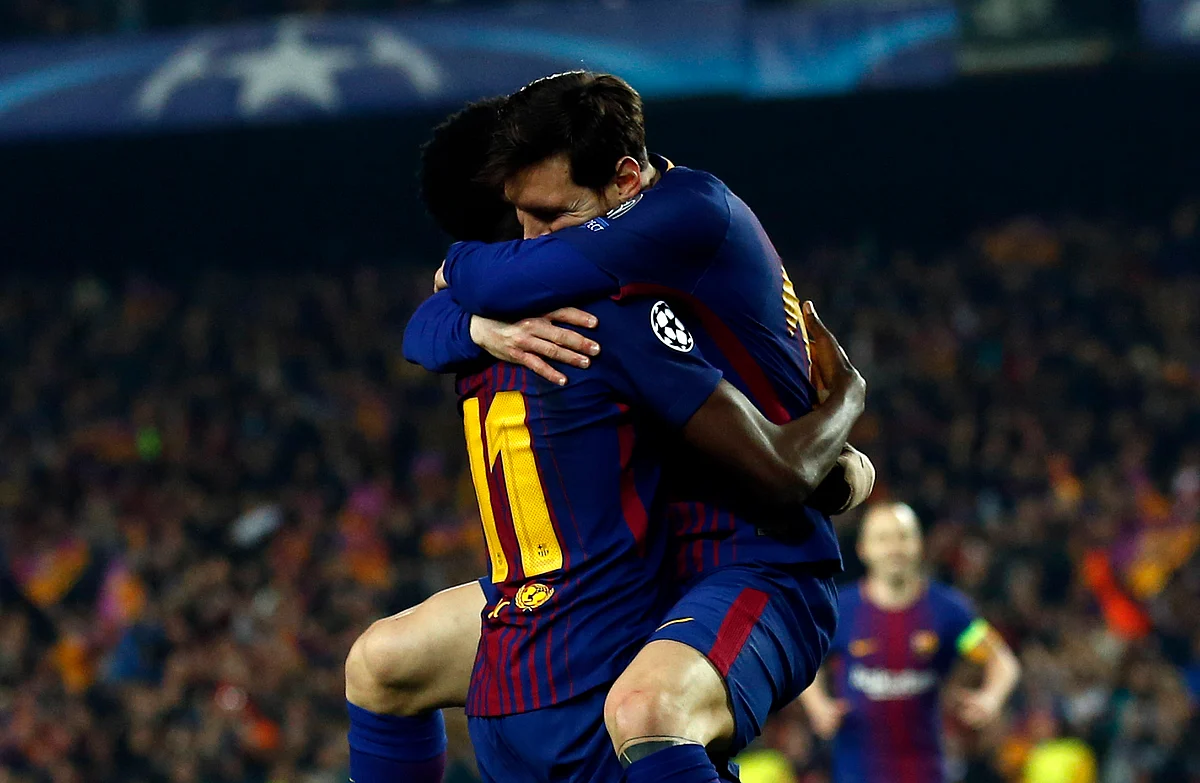Barcelona’s Ousmane Dembele, left, celebrates with Lionel Messi after scoring his side’s second goal during the Champions League round of sixteen second leg soccer match between FC Barcelona and Chelsea at the Camp Nou stadium in Barcelona, Spain, Wednesday, March 14, 2018.
