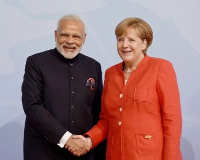 Modi makes congratulatory call to Angela Merkel. (Photo: IANS/PIB)
