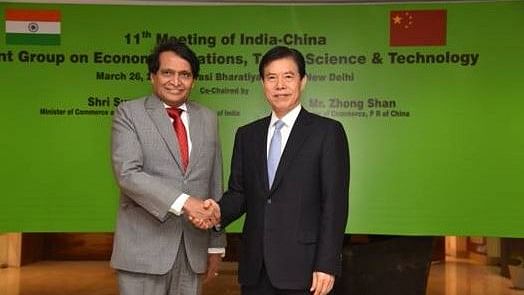 Commerce and Industry Minister Suresh Prabhu with his Chinese counterpart at the 11th joint economic group (JEG) meeting held on 26 March.&nbsp;