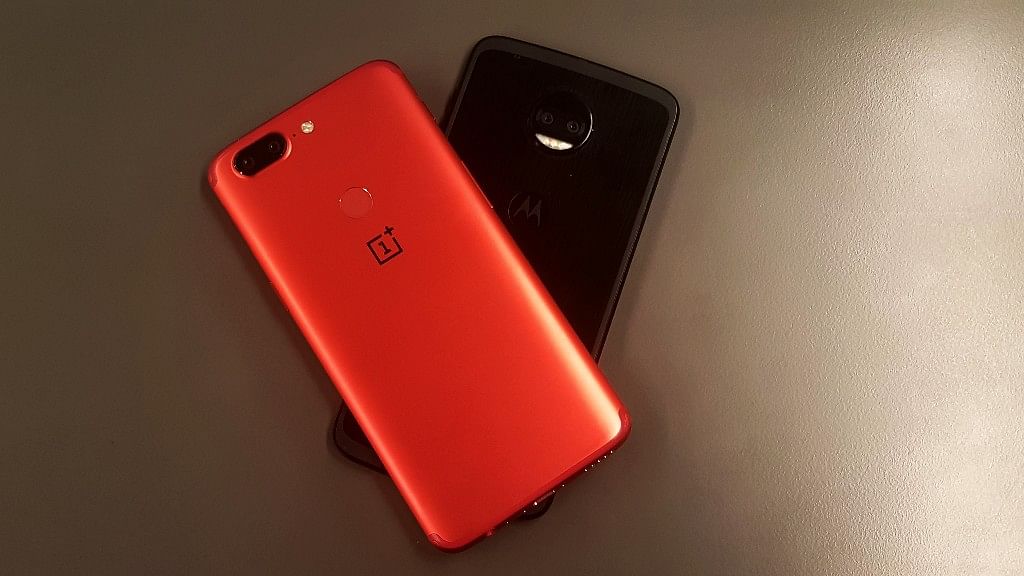 OnePlus 5T (in red) and Moto Z2 Force (Black).