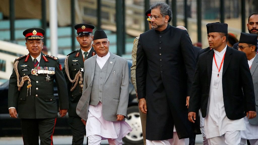 Nepal Prime Minister KP Oli (left) and Pakistan PM Shahid Khaqan Abbasi (right)