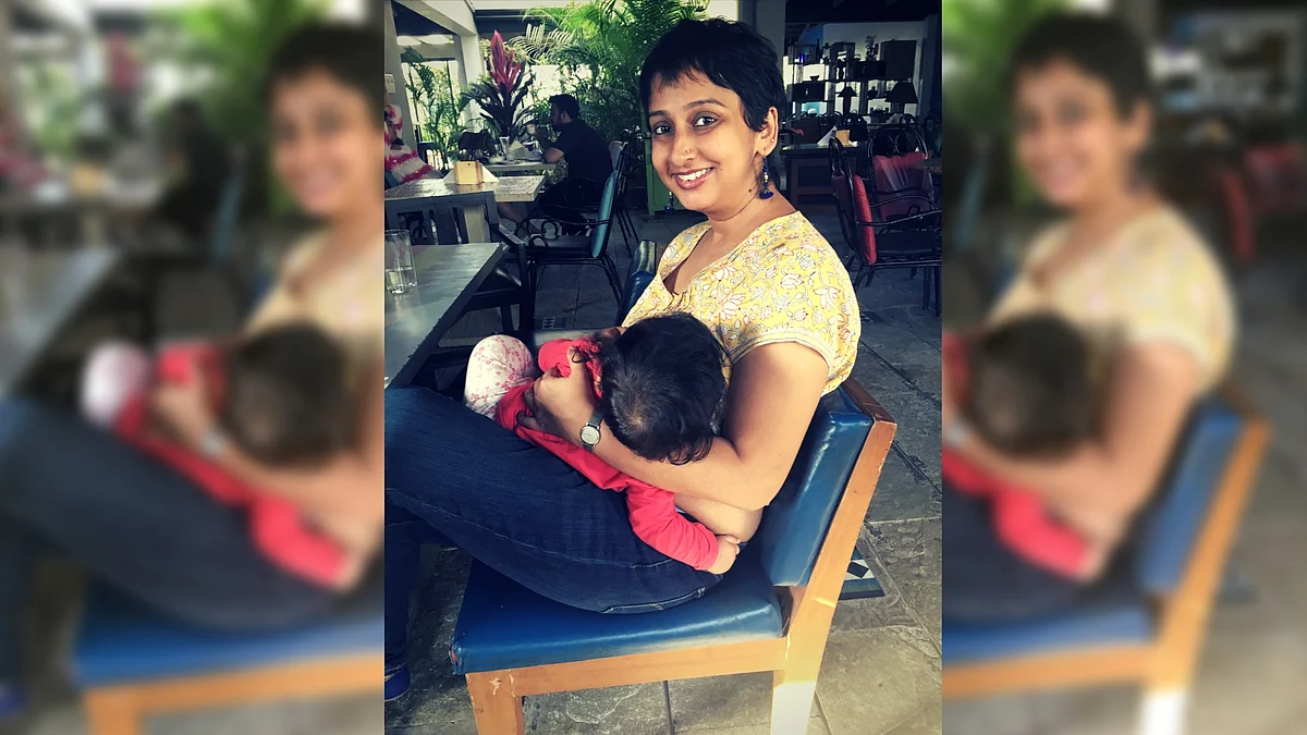 Adhunika with her younger child.