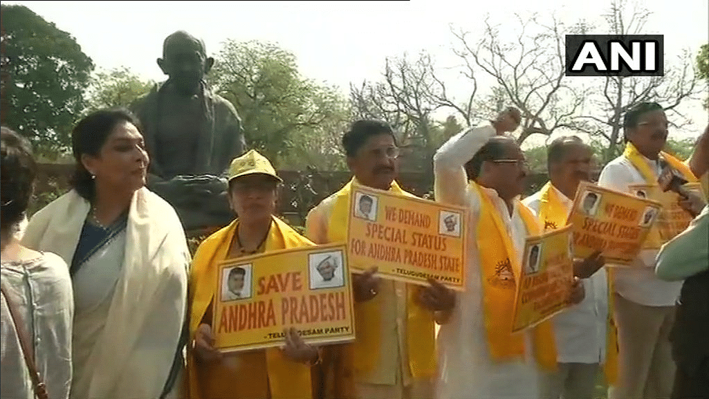 Congress leader Renuka Chowdhury joins protesting TDP members outside Parliament.