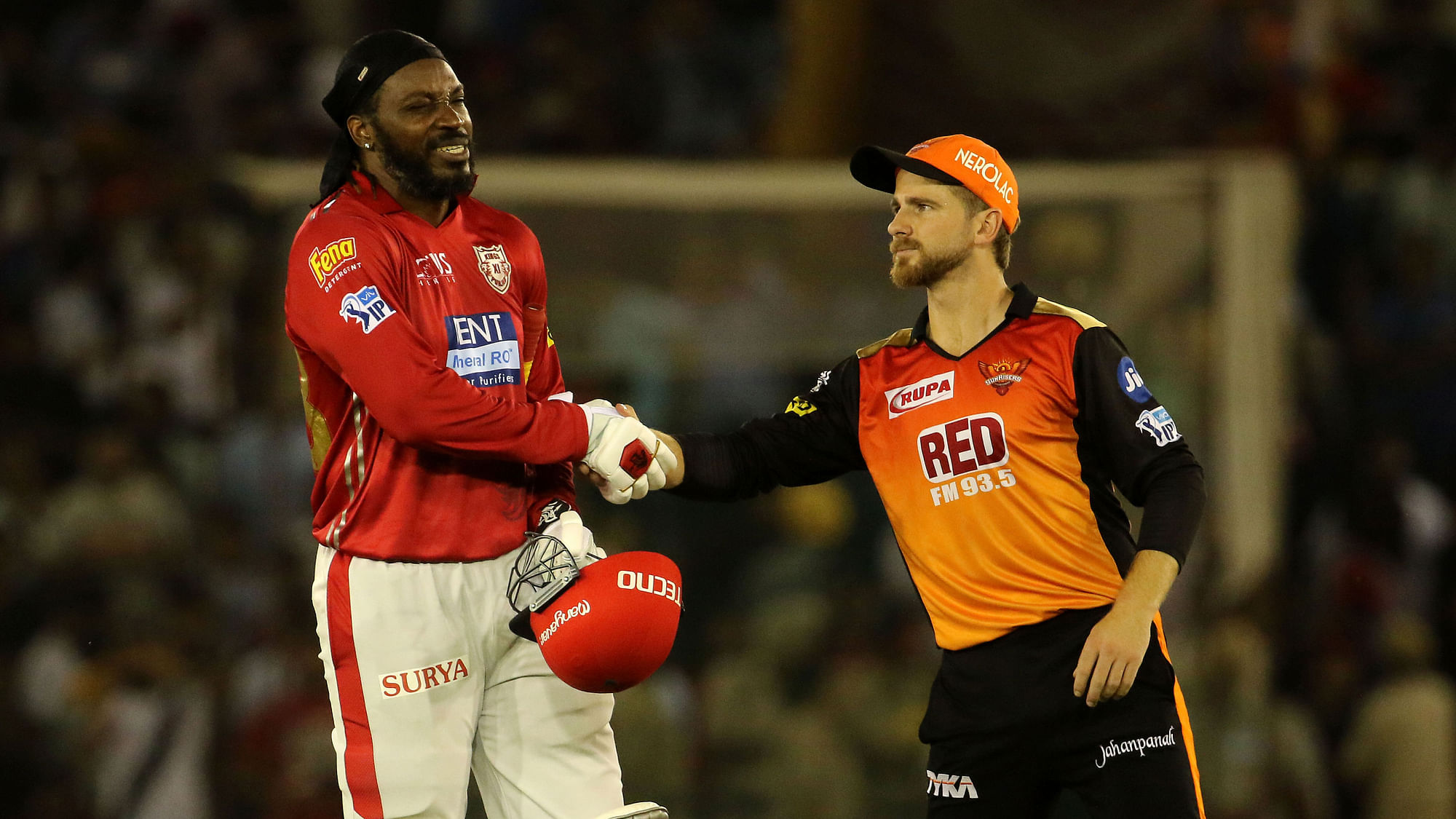 Kane Williamson greets Chris Gayle after the latter smashed a century against Sunrisers Hyderabad.