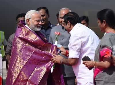 Chennai: Prime Minister Narendra Modi being welcomed by the Governor of Tamil Nadu, Banwarilal Purohit and the Chief Minister of Tamil Nadu Edappadi K. Palaniswami, on his arrival, at Chennai, Tamil Nadu on April 12, 2018. (Photo: IANS/PIB)