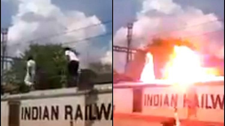 Ranjith and another cadre can be seen running on top of a train clearly ignoring the high-tension wires above their heads.