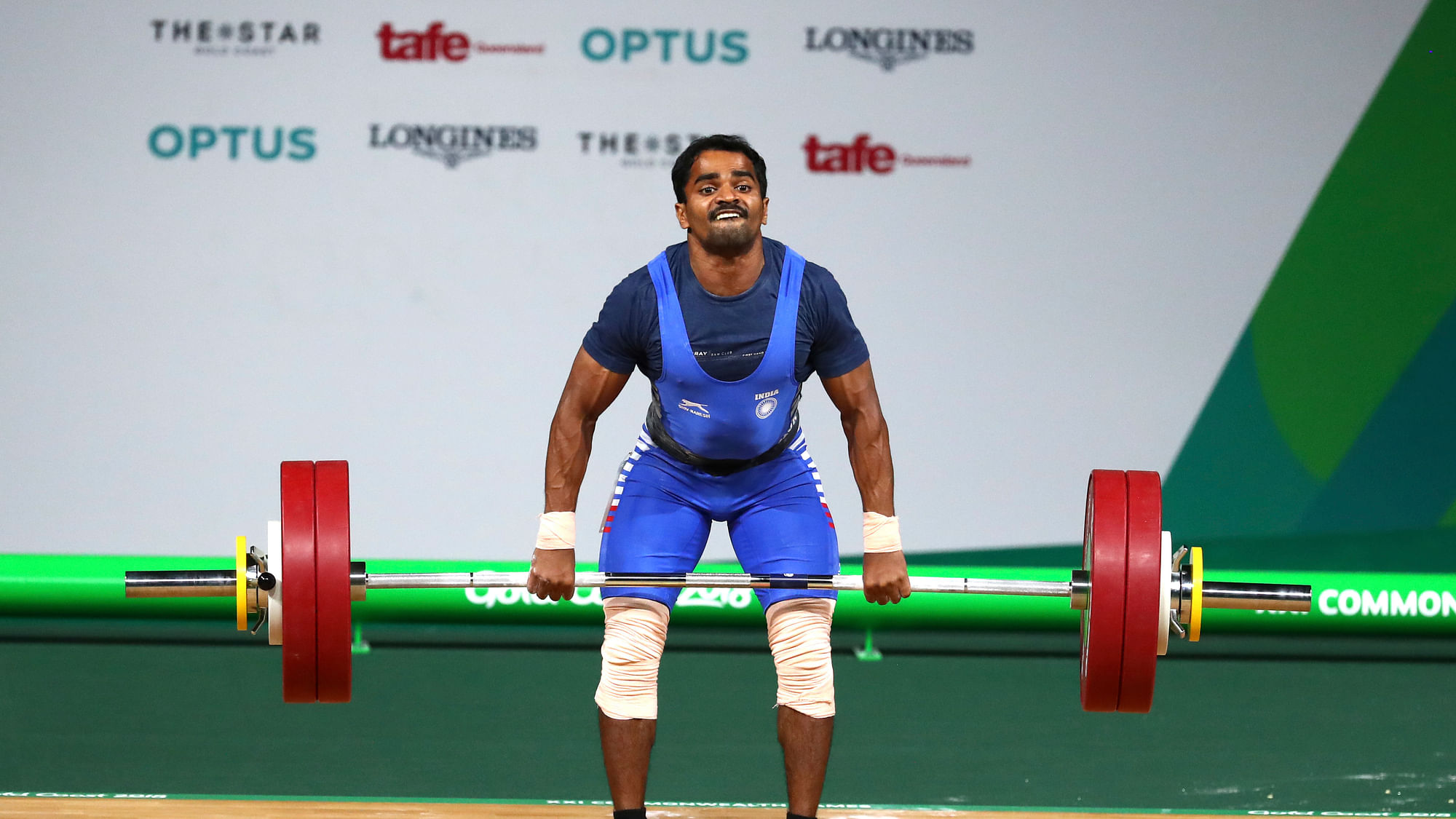 India’s Gururaja competes in Men’s 56kg Weightlifting at Commonwealth Games in Gold Coast, Australia.