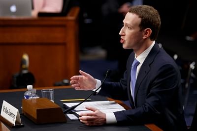 Zuckerberg vows to revamp Facebook, admits his own data was shared